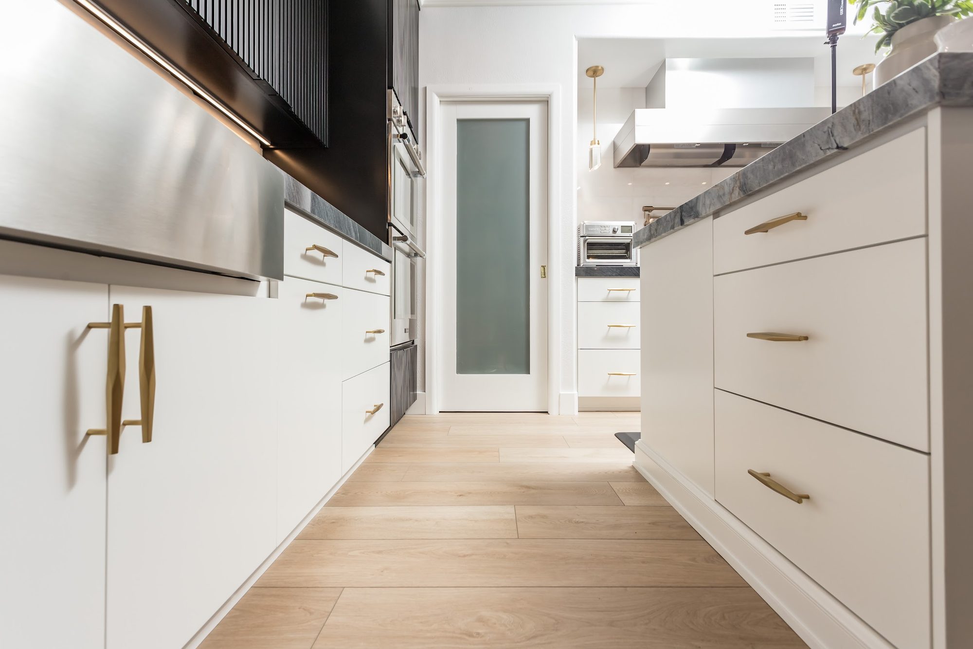 Contemporary Fluted Cabinetry Kitchen Remodel — Houston, TX photo 21