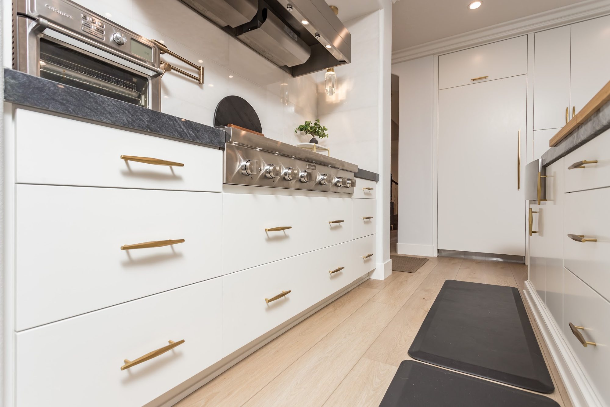Contemporary Fluted Cabinetry Kitchen Remodel — Houston, TX photo 22
