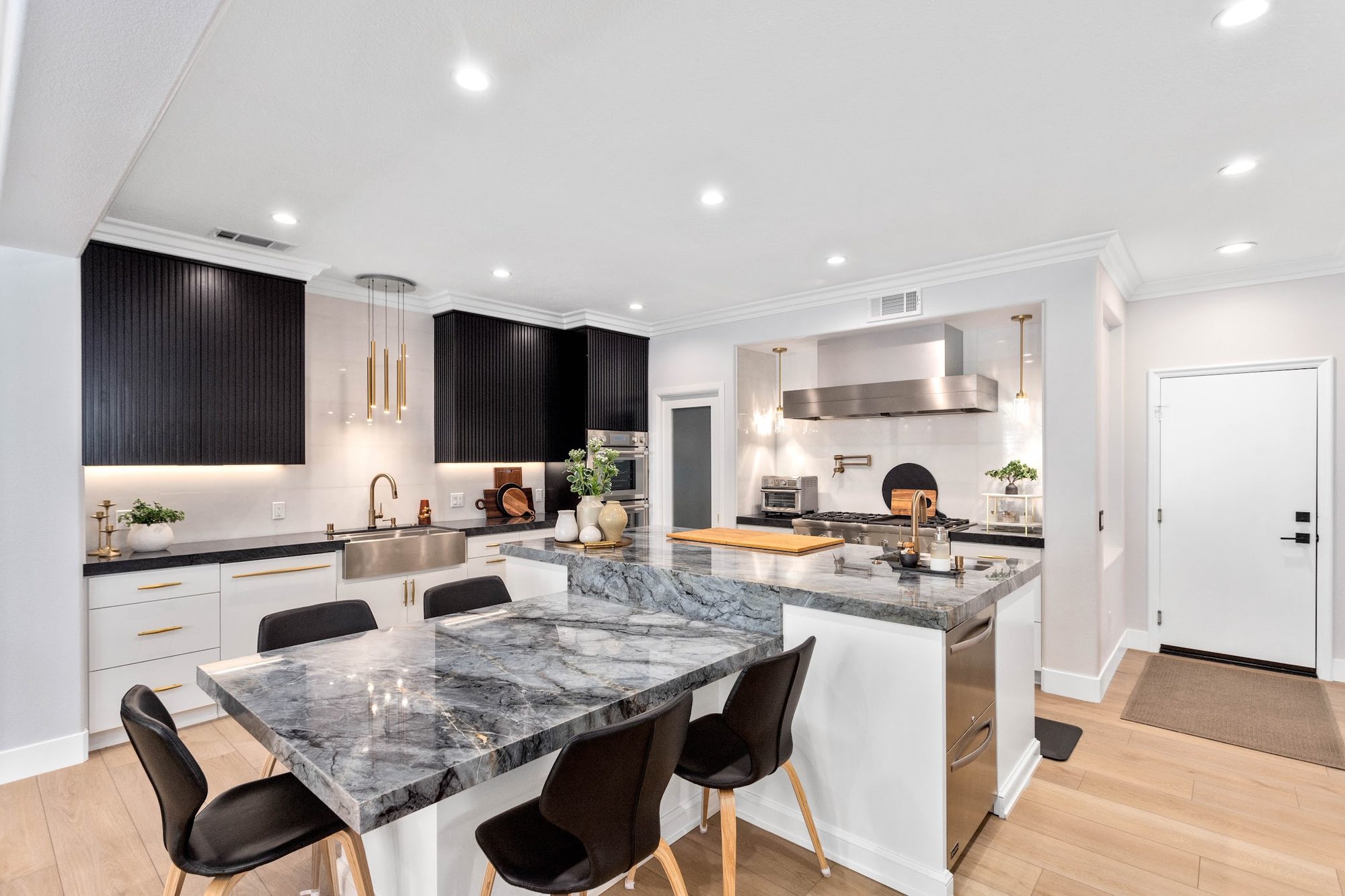 Contemporary Fluted Cabinetry Kitchen Remodel — Houston, TX photo 6