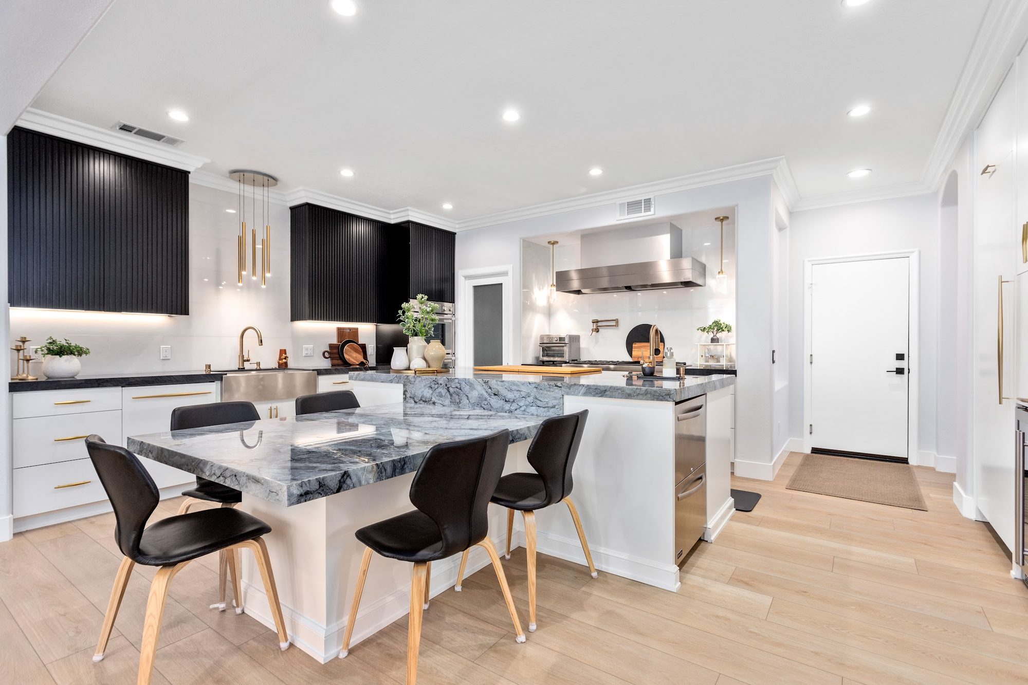 Contemporary Fluted Cabinetry Kitchen Remodel — Houston, TX photo 8