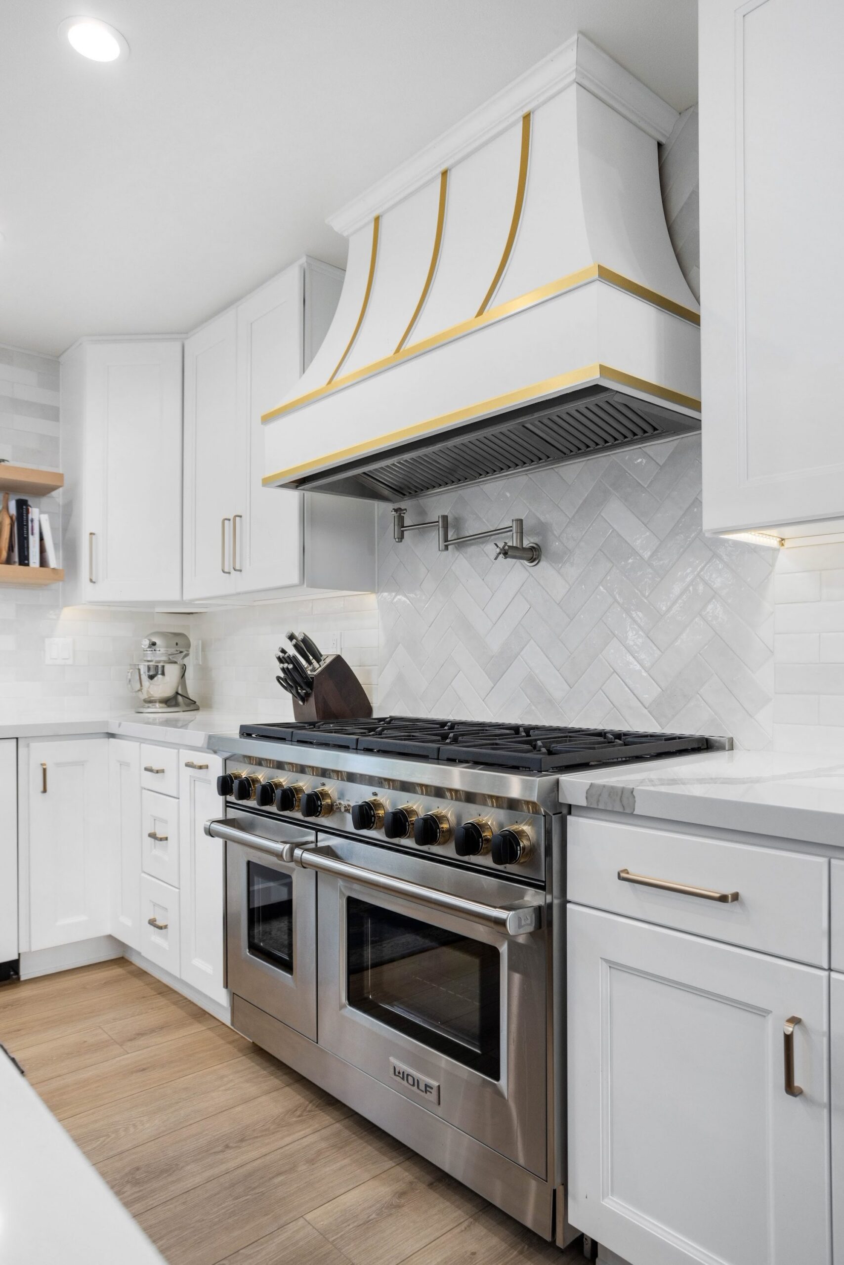 Brass-Accented White Kitchen Remodel — Houston, TX photo 13