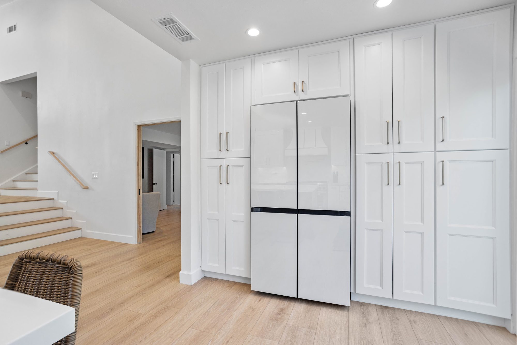 Brass-Accented White Kitchen Remodel — Houston, TX photo 16