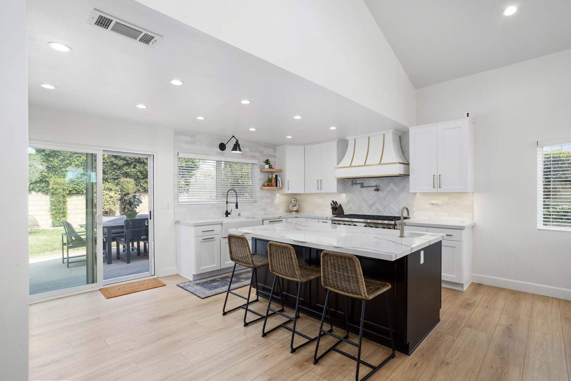 Brass-Accented White Kitchen Remodel — Houston, TX photo 3