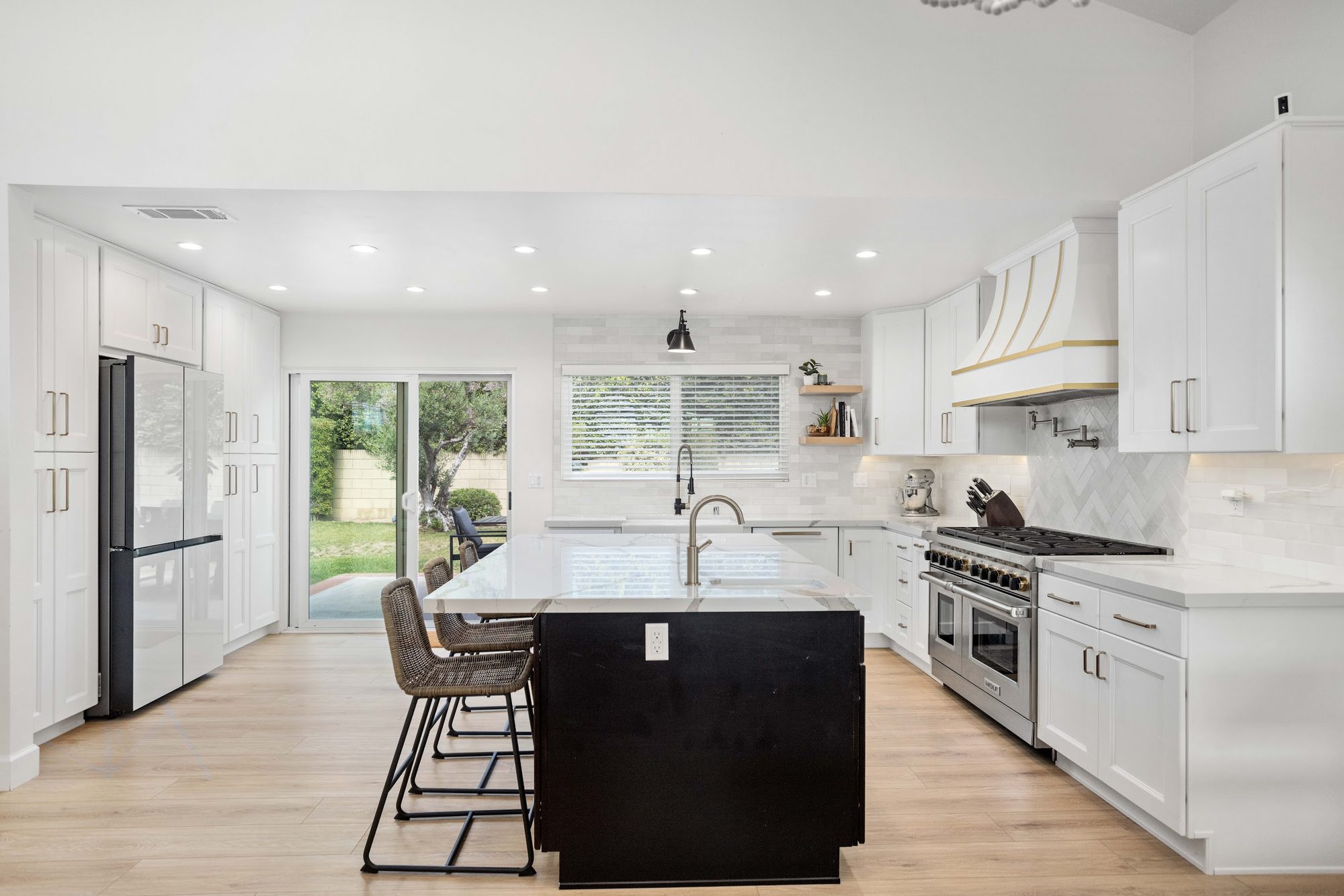 Brass-Accented White Kitchen Remodel — Houston, TX photo 4