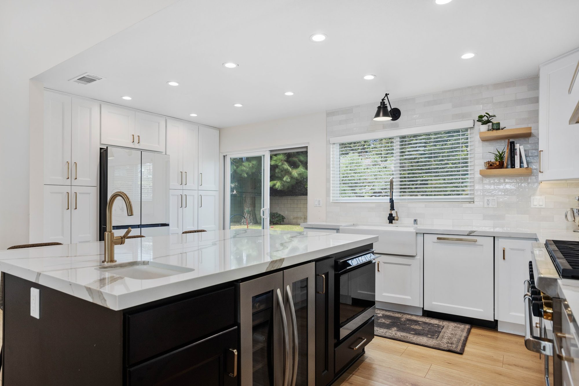 Brass-Accented White Kitchen Remodel — Houston, TX photo 5