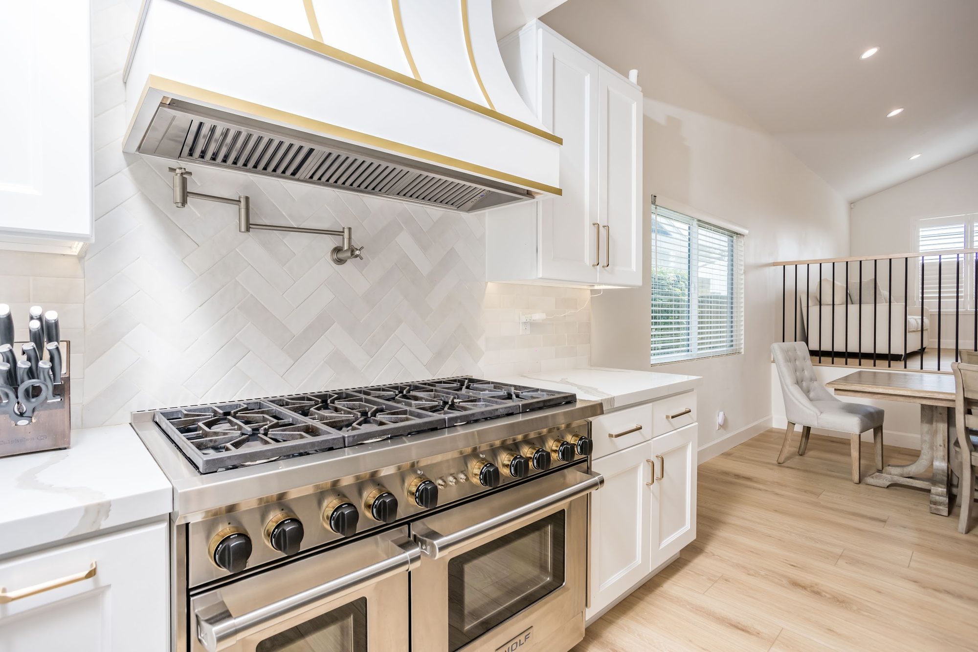 Brass-Accented White Kitchen Remodel — Houston, TX photo 6