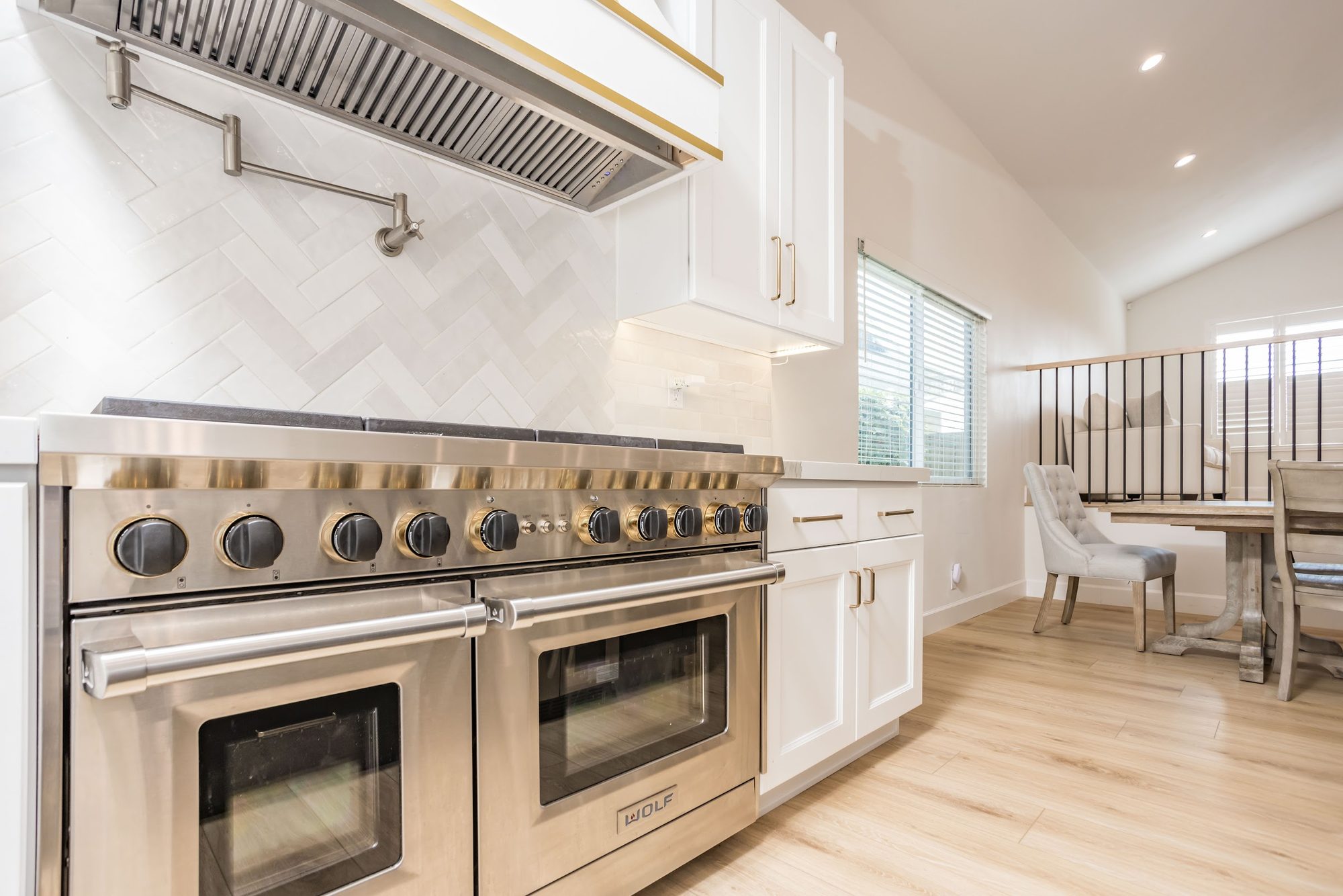 Brass-Accented White Kitchen Remodel — Houston, TX photo 7
